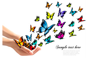 Hands Releasing Colorful Butterflies