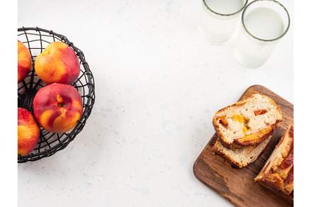 Peach cake loaf on wooden cutting