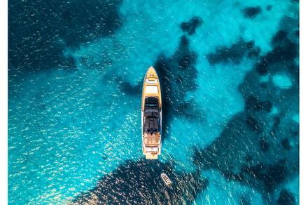 Aerial view of luxury yacht and boat, a Nature Photo by den-belitsky