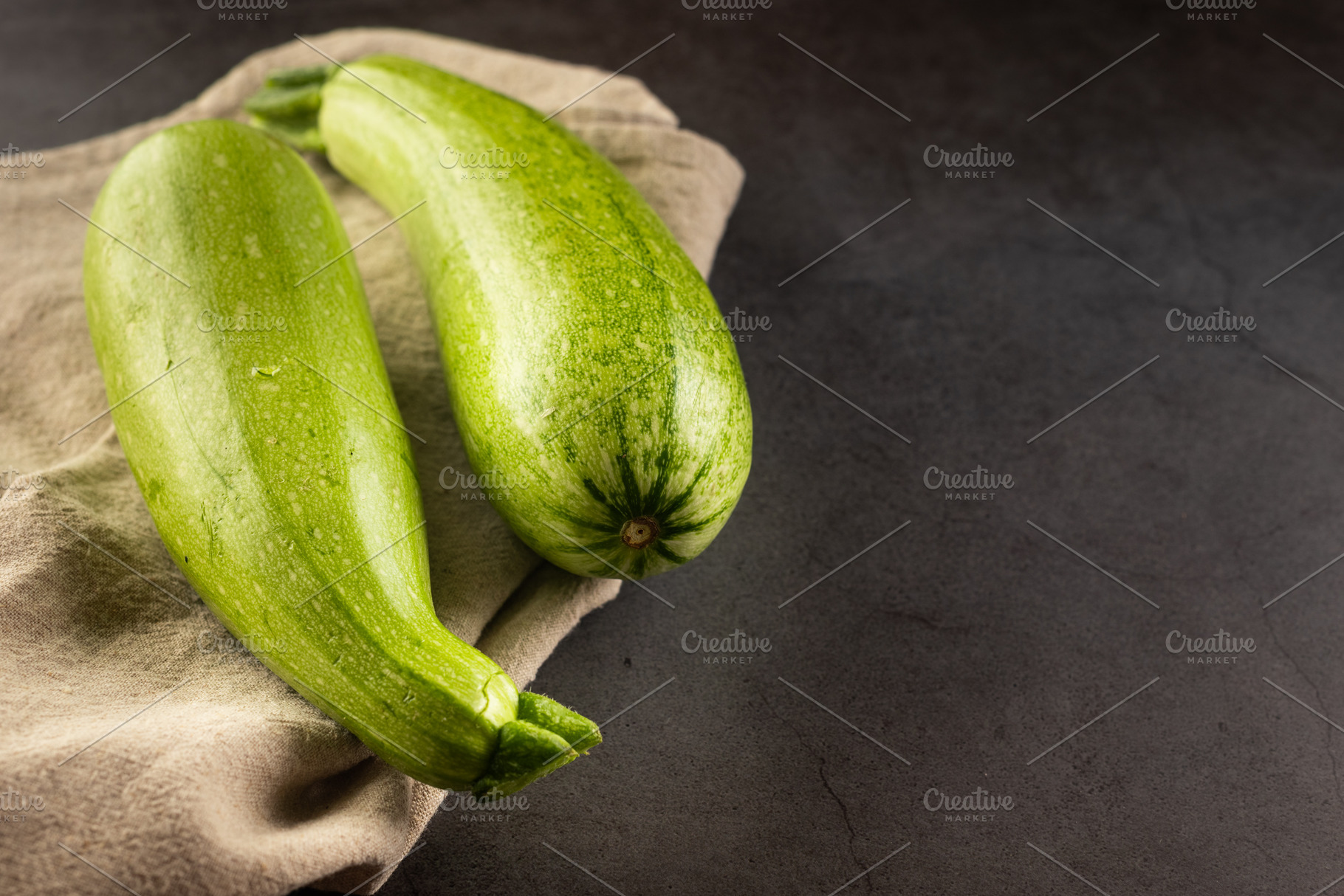 Fresh young zucchini on Dark Table - Summer Harvest, a Food & Drink Photo by vimart