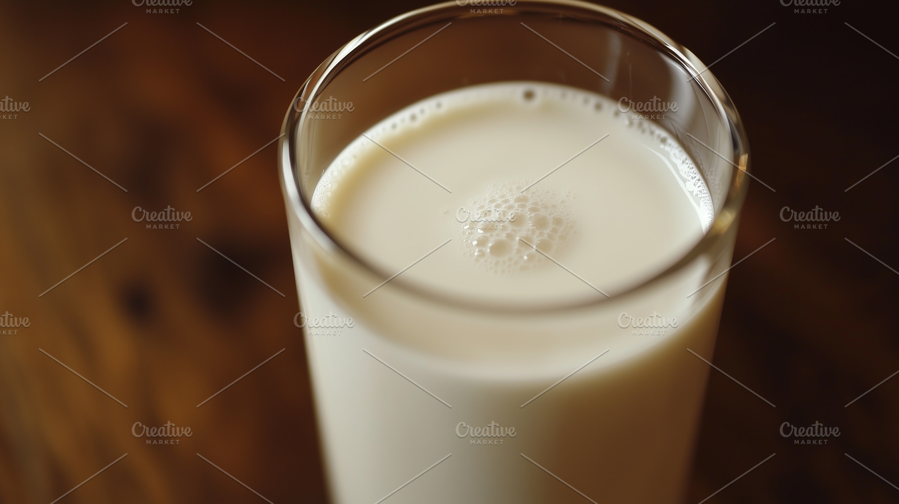 Milk in a glass on wooden background, a Food & Drink Photo by MistyDay