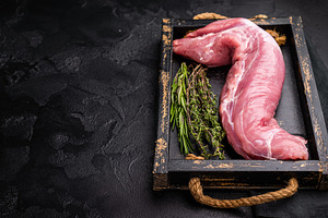 Raw pork tender cut, tenderloin featuring a smooth texture, perf, a Food & Drink Photo by composter-box@mail.ru