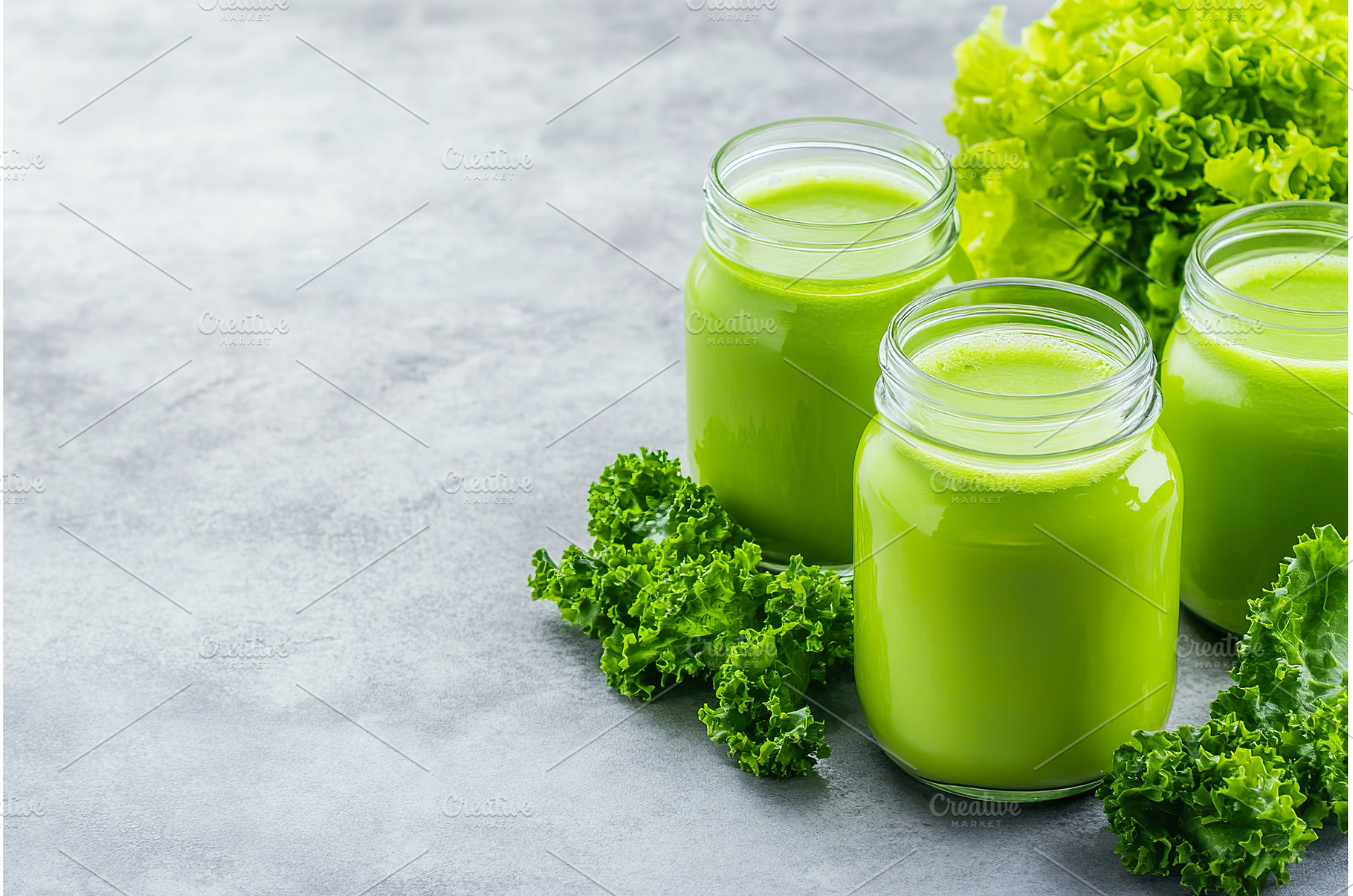 Fresh green smoothies in glass jars, a Food & Drink Photo by Lermont51