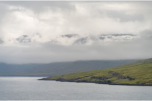 Low clouds over the mountains, a Nature Photo by Backyard Stock