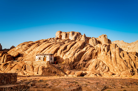 Egyptian mountains and old small hut
