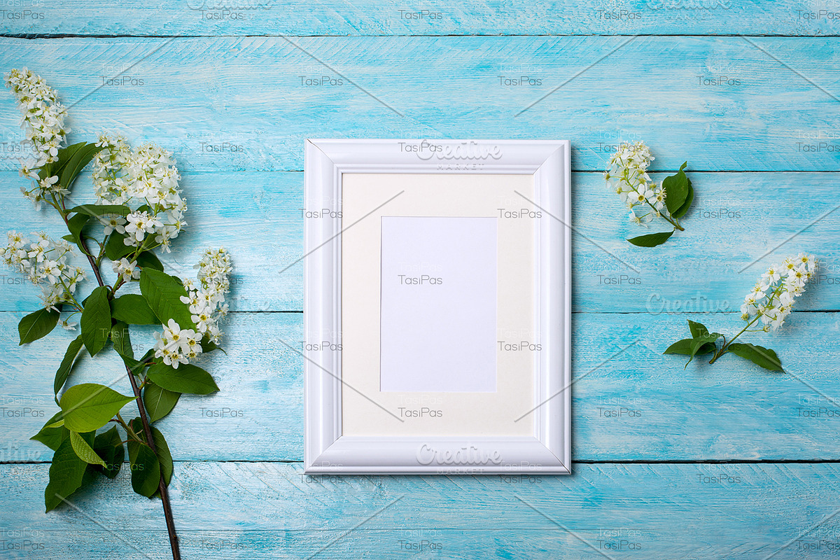 White frame mockup on blue, a Print Template by TasiPas (Photo 3 of 4)