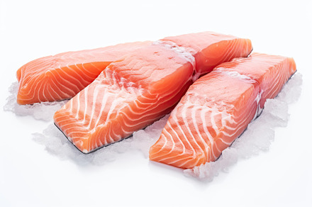 Fresh salmon fillet on white background, a Food & Drink Photo by AlyaAnd