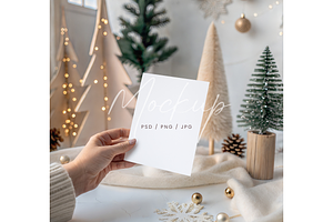 Winter Card Mockup in Hand, a Product Mockup by TatiMockup