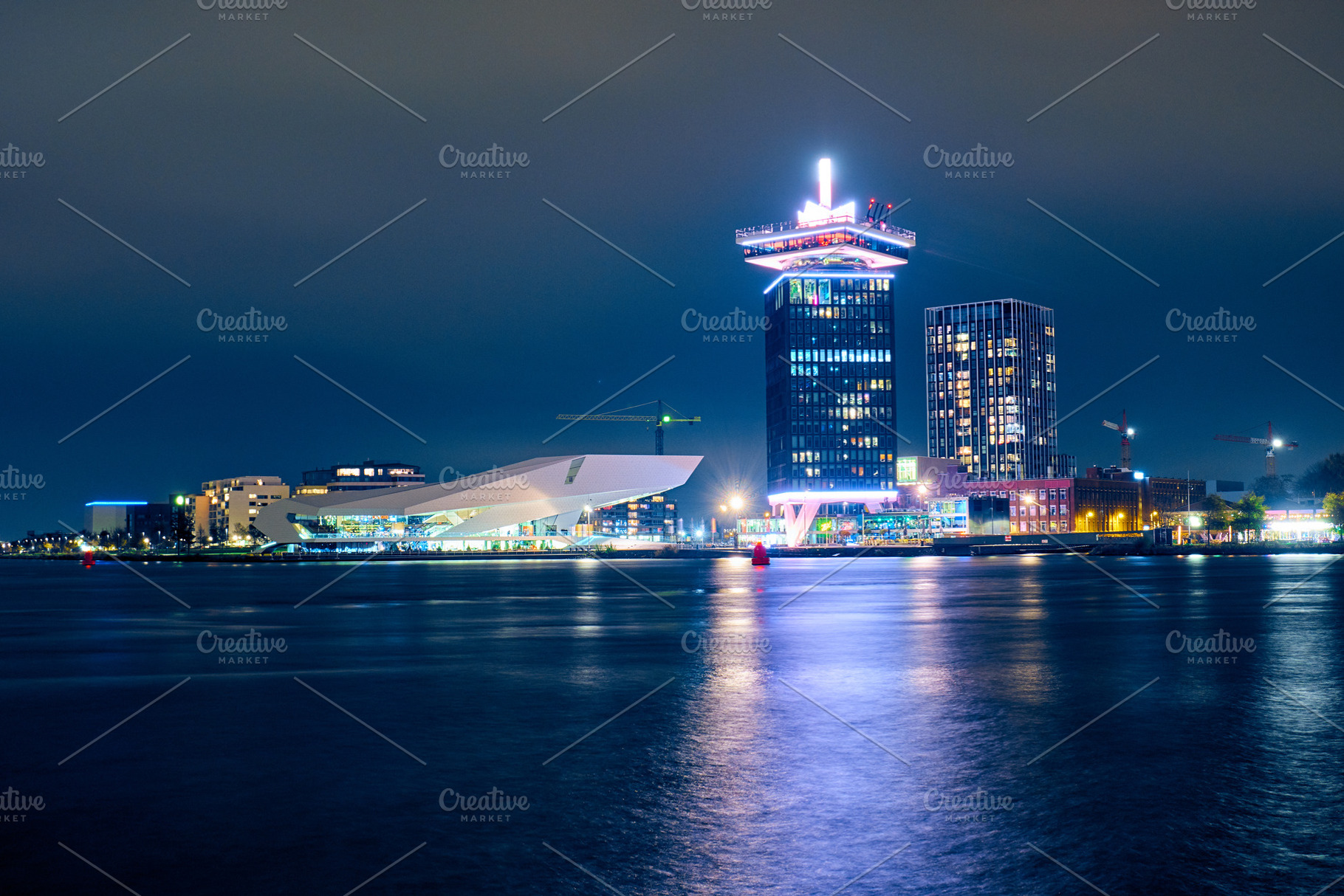 Modern buildings in Amsterdam, a Background Photo by badahos