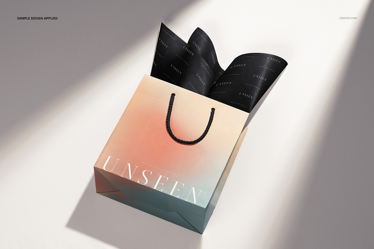 Tissue Paper in Gift Bag Mockup, a Packaging Mockup by creatsy5 (Photo 4 of 14)