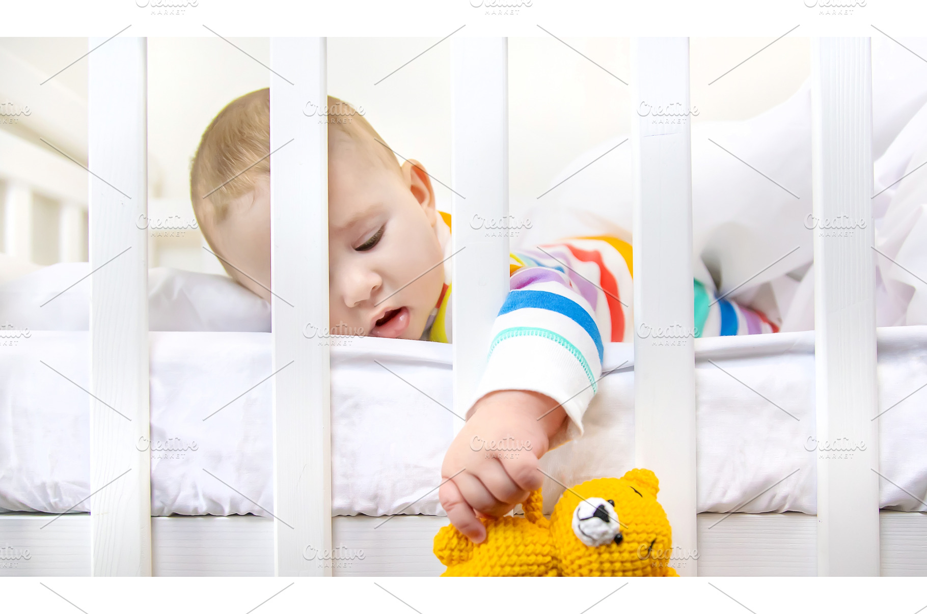 The baby in the crib goes to bed, a Person Photo by yanadjana