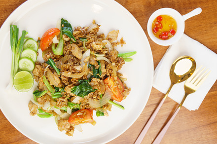 Delicious stir fried rice with vegetables, meat, and side of dipping sauce. Thi, a Photo by a454