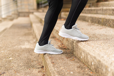 Runner climbing the stairs. Detail of the feet. Unrecognizable., a Sports & Recreation Photo by Iván Moreno STOCK PHOTO