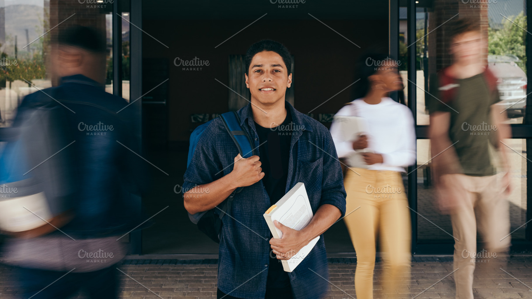 Male student at college campus, a School & Education Photo by Jacob Lund
