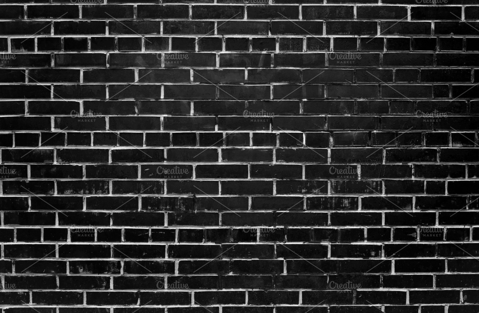 Painted black brick wall. in a row., an Abstract Photo by KulT design