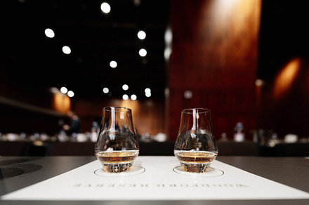 Whiskey tasting. Bright glasses with alcohol.