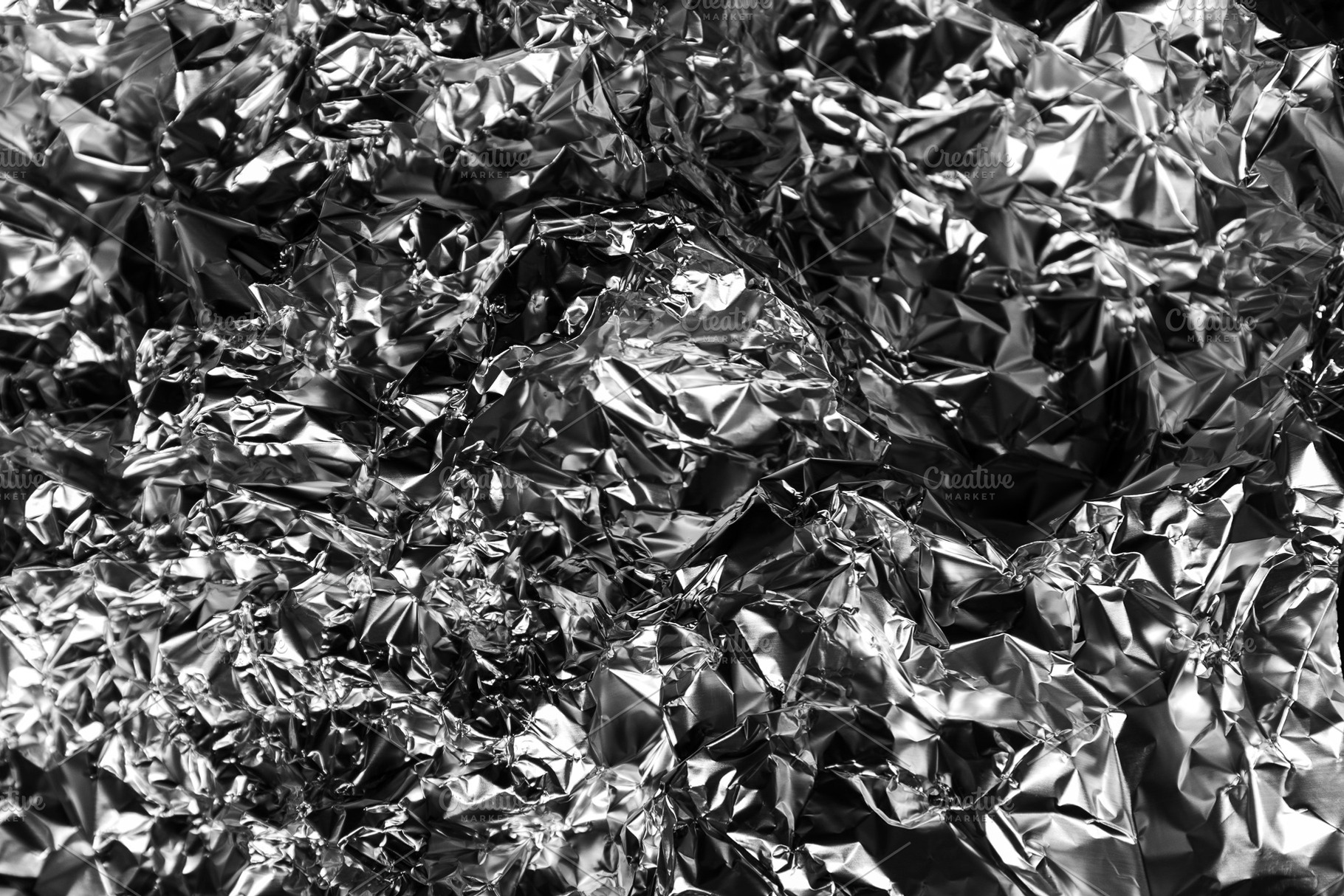 Shiny crumpled foil with metallic ab, a Background Photo by Edalin's Store