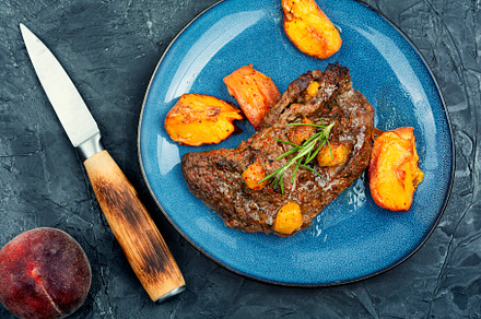 Roasted meat beef steak with peach., a Food & Drink Photo by MLunov MLunov
