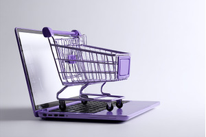 The image features a shopping cart, a Technology Photo by ZinetroN