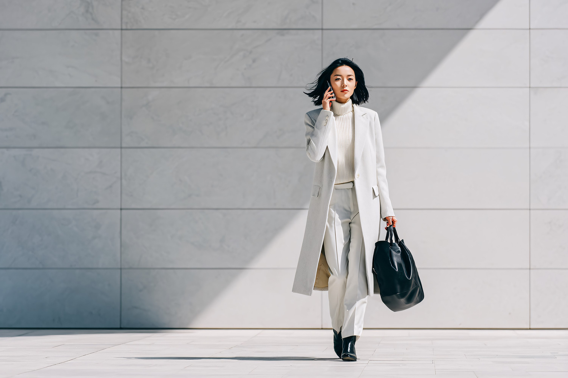 Businesswoman on Phone Outdoors, a Business Photo by shahsoft