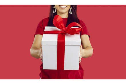 Woman give wrapped present box, a Person Photo by StudioRomantic