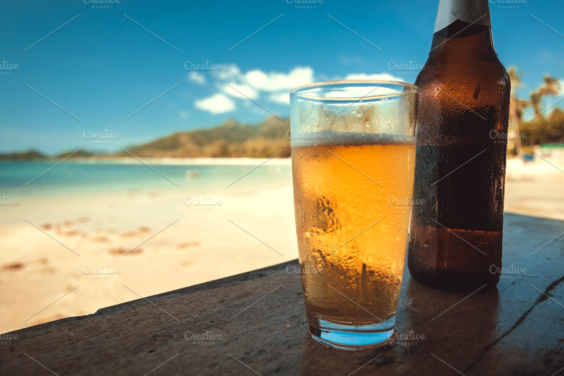 Sunny beach and beer glass, a Food & Drink Photo by Radiokafka