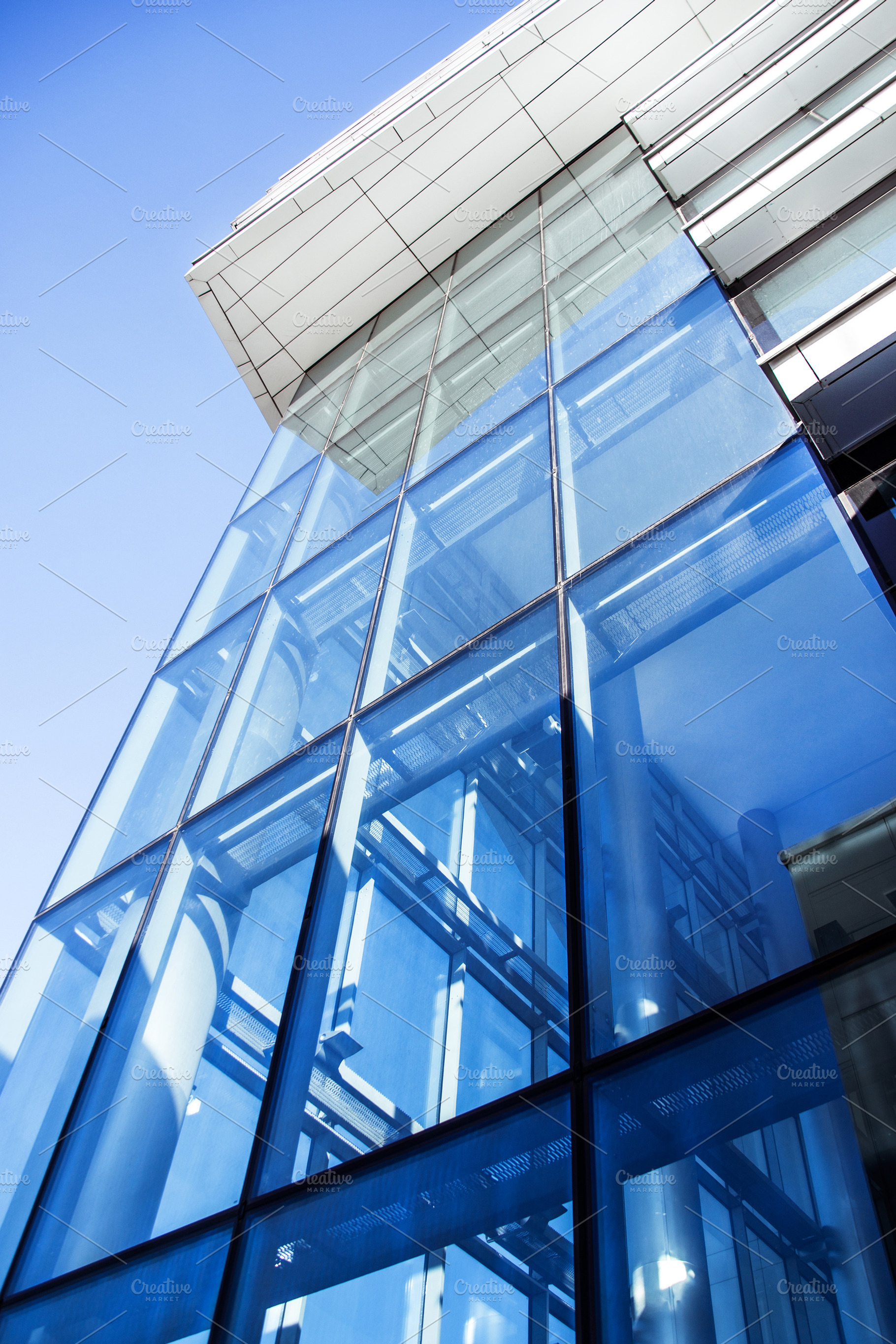 Blue glass wall of modern office bui stock photo containing contemporary and, an Architecture Photo by UltraShop