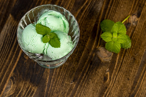delicious green cold ice cream with mint flavor and smell, a Photo by rsoollAI