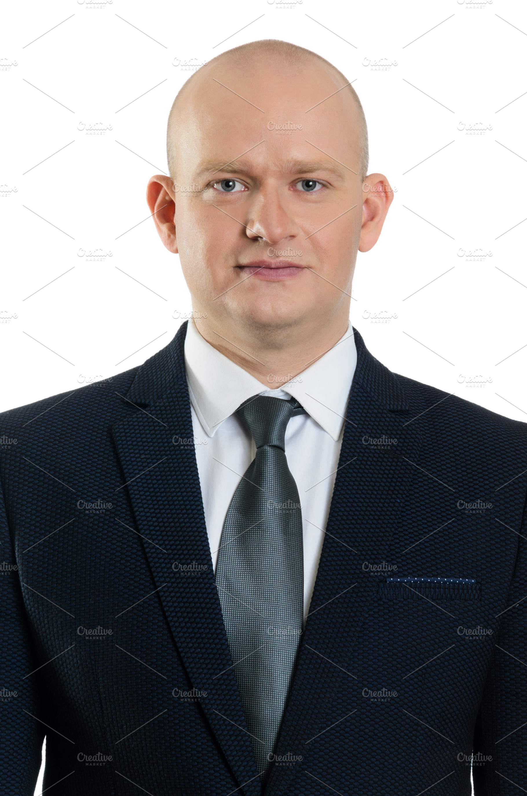 Business man portrait featuring bald, business, and businessman, a Person Photo by sergeypeterman