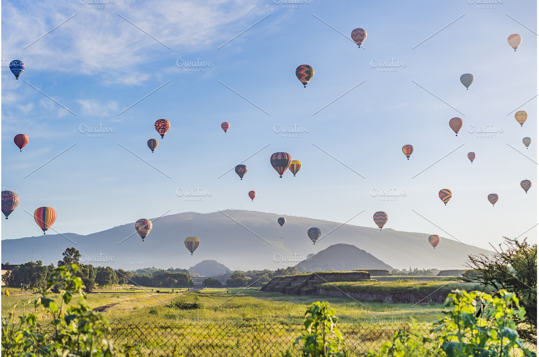 Colorful hot air balloons floating, an Architecture Photo by Elizaveta Galitskaya
