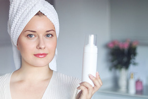 Beauty routine, morning skincare and wellness. A happy smiling b, a Person Photo by Studio ANNA