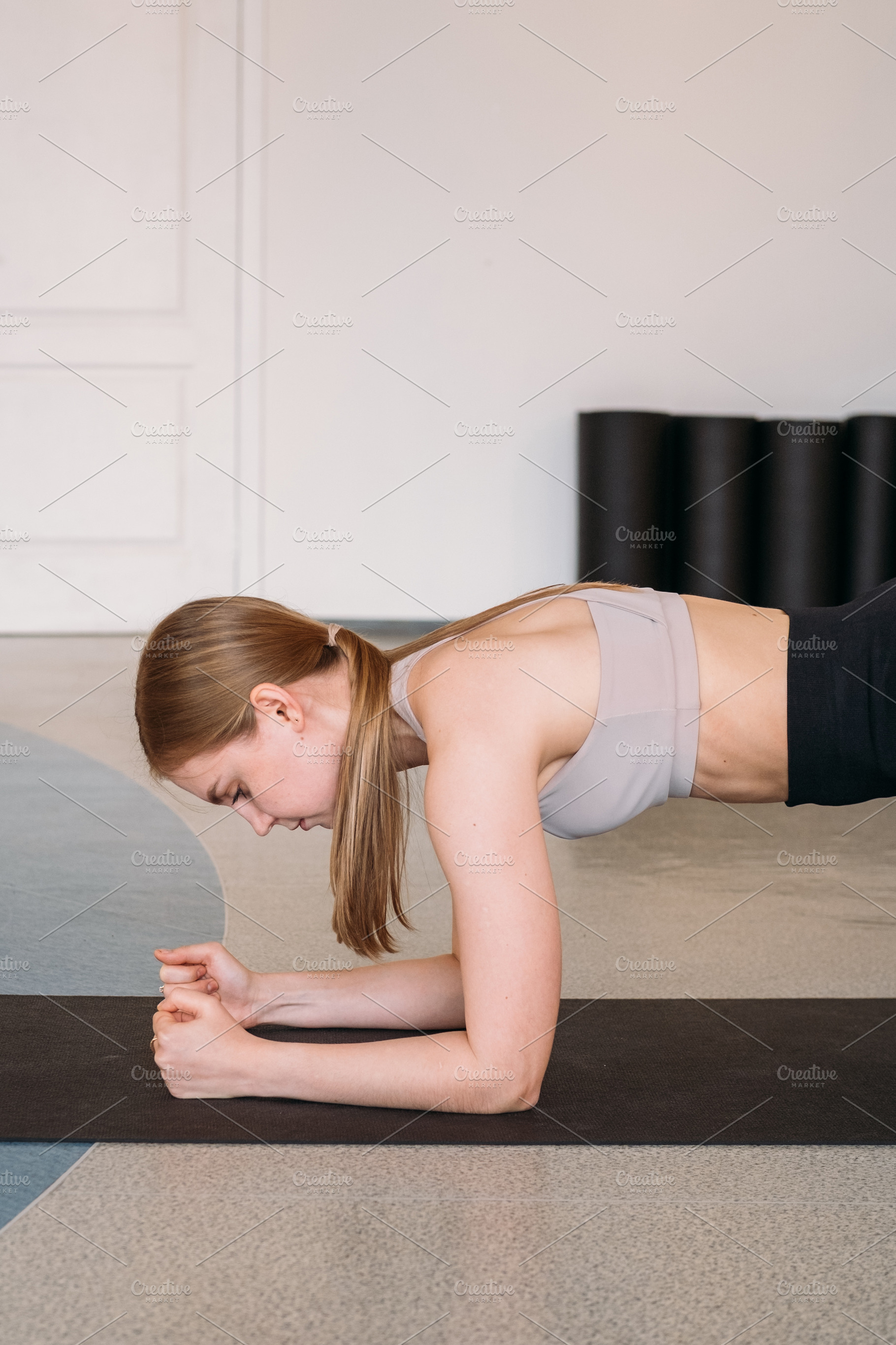 Female exercise core strength training plank gym, a Person Photo by Photo Drive Studio
