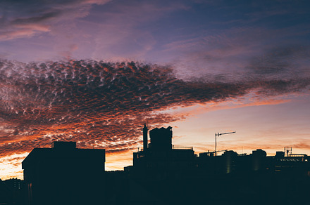 Coloured cloudscape in the city, an Architecture Photo by SkyNext