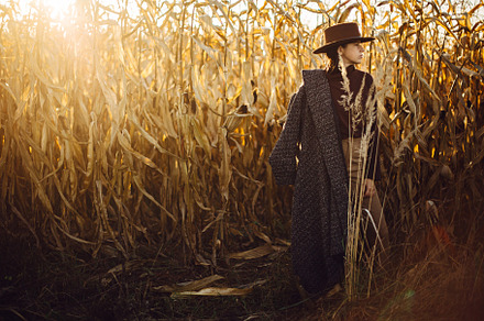 Stylish woman in autumn maize, a Person Photo by Sonjachni