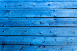 Horizontal planks of wood painted in bright blue with visible gr, a Background Photo by Ales Munt