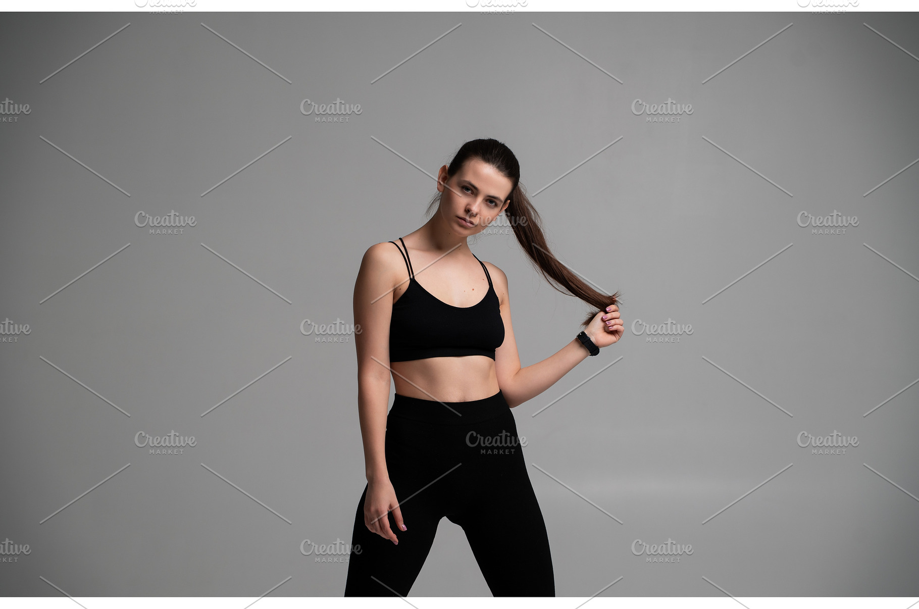 Woman posing in black sportswear, a Sports & Recreation Photo by volodymyrshtun13795