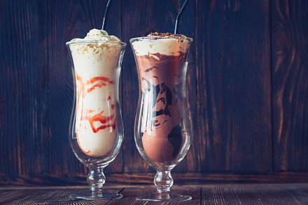 Two glasses of milkshake containing background, berry, and beverage, a Food & Drink Photo by Alexander Prokopenko