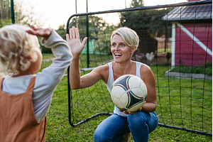 Little boy playing with ball with, a Sports & Recreation Photo by HalfPoint