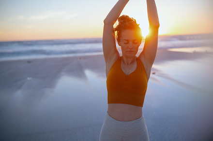 healthy sports woman in sport clothes stretching, a Sports & Recreation Photo by Alliance Images