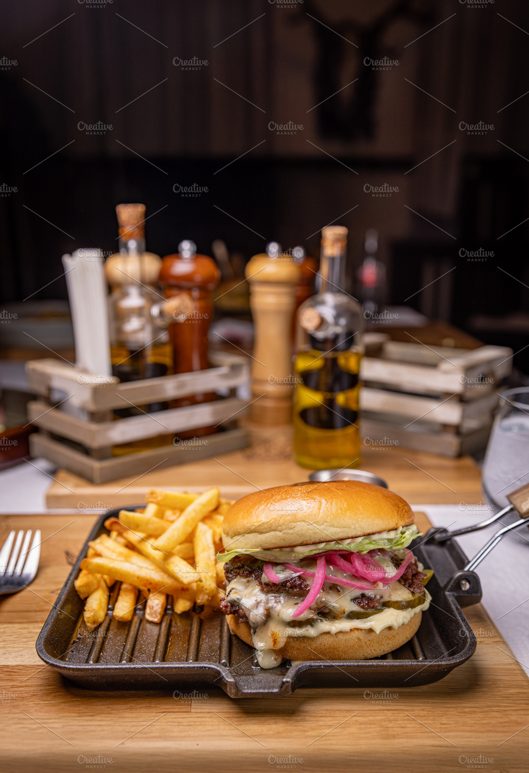 Delicious burger with french fries, a Photo by Grafvision photography