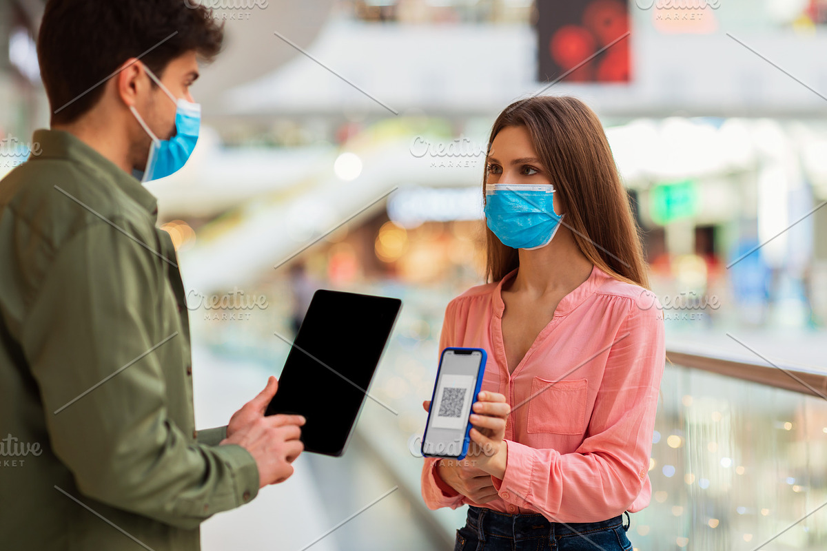 Female Showing Cellphone With QR Code For Scanning In Hypermarket, a ...