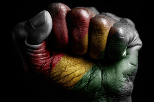 Fist with colors of country flag, a Photo by Beautiful things