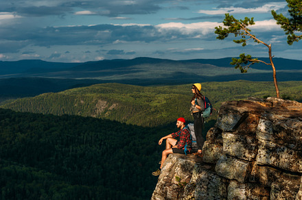 A man and a woman in the mountains, a Person Photo by SOTNIKOV_MISHA
