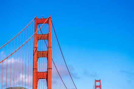 Golden Gate Bridge over blue waters with scenic hills in San Fra, an Architecture Photo by GoodGoods