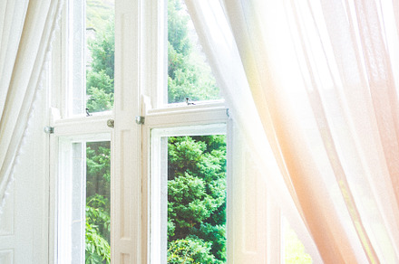 Window with curtains containing window, curtains, and antic