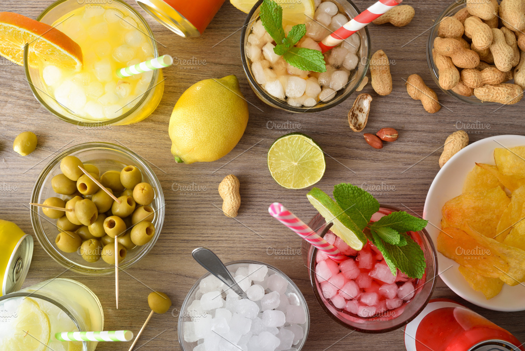 Refreshing drinks and snacks on wooden table top view, a Food & Drink Photo by Davizro's Market