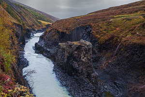 Autumn  picturesque Studlagil canyon is a ravine in Jokuldalur,, a Nature Photo by YuriyB