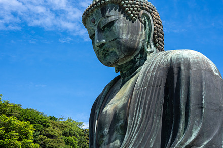Great Buddha statue close-up view at Kotoku-in temple in Kamakur, an Architecture Photo by GoodGoods