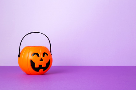 Halloween celebration. Pumpkin flashlight jack, on  purple backg, a Holiday Photo by matucha