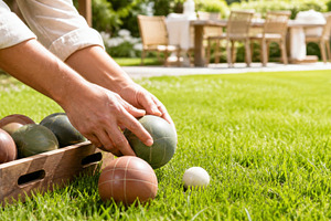 Lawn games in backyard setting durin, a Photo by Dvoevnore photos